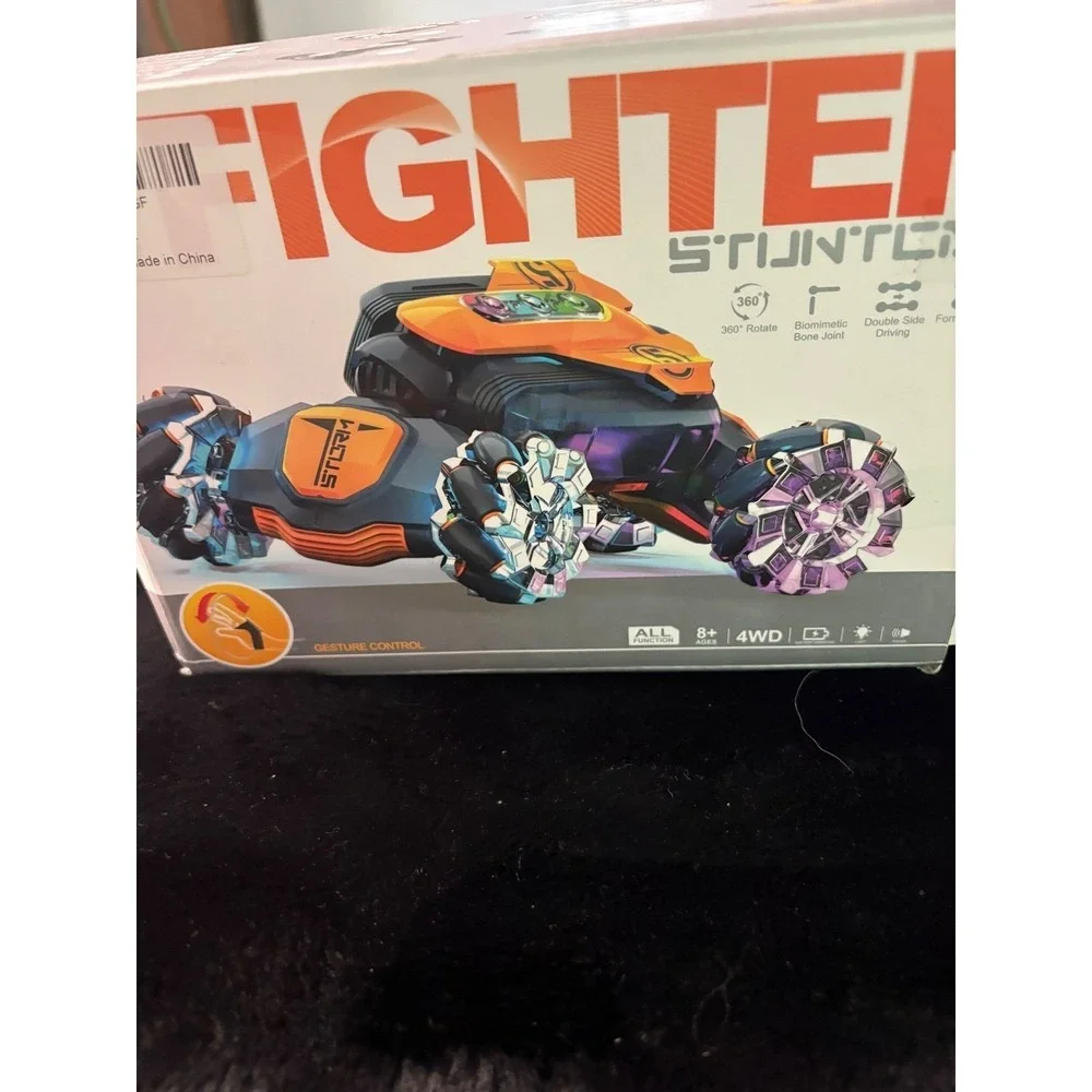 Fighter Stunt Car Gesture Control RC Vehicle 4WD 360 Rotation Orange Black Toy